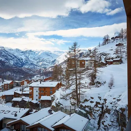 With Fascinating Views Over * Zermatt